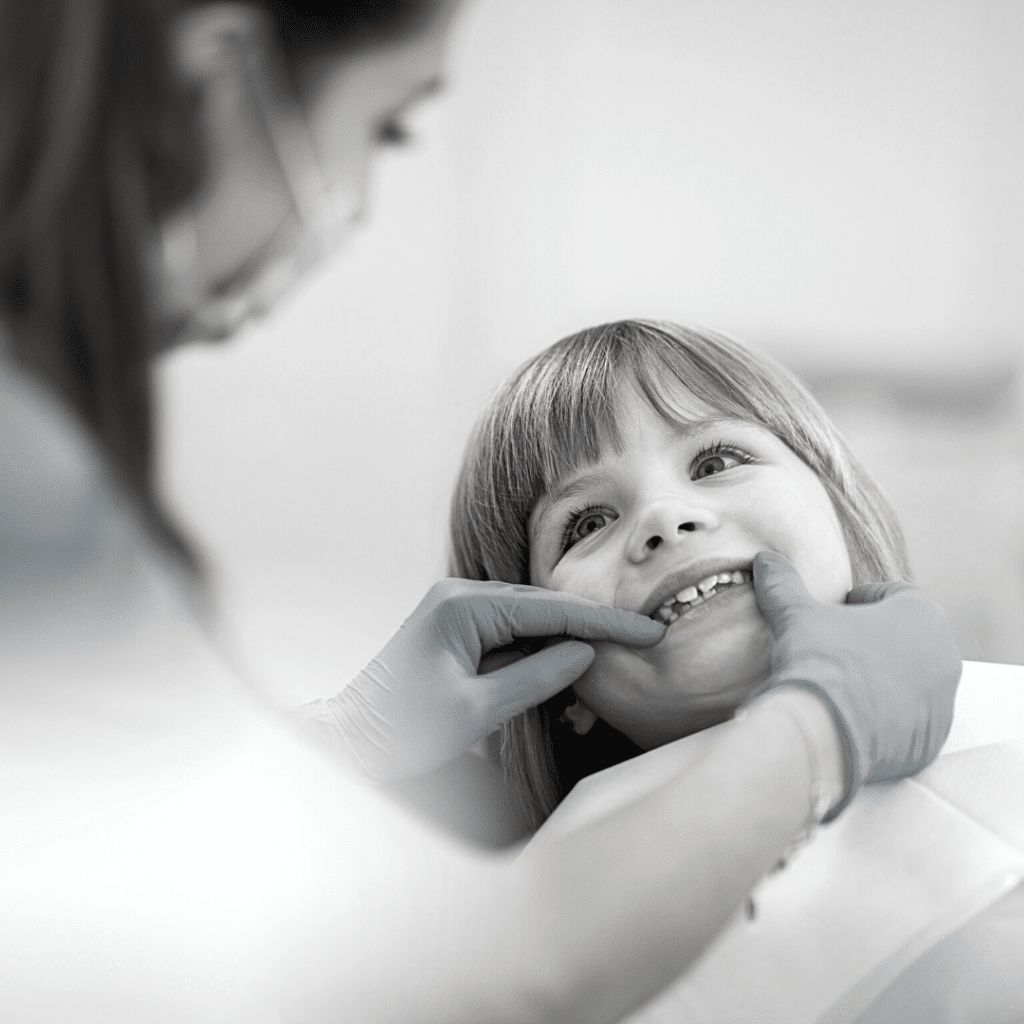 photo of small child getting oral hygiene check up