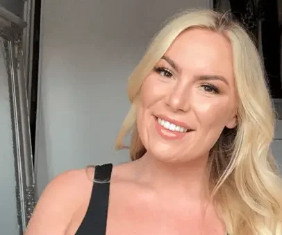 Photograph of our dental therapist Mollie with a bright white smile after having had Boutique Whitening Treatment